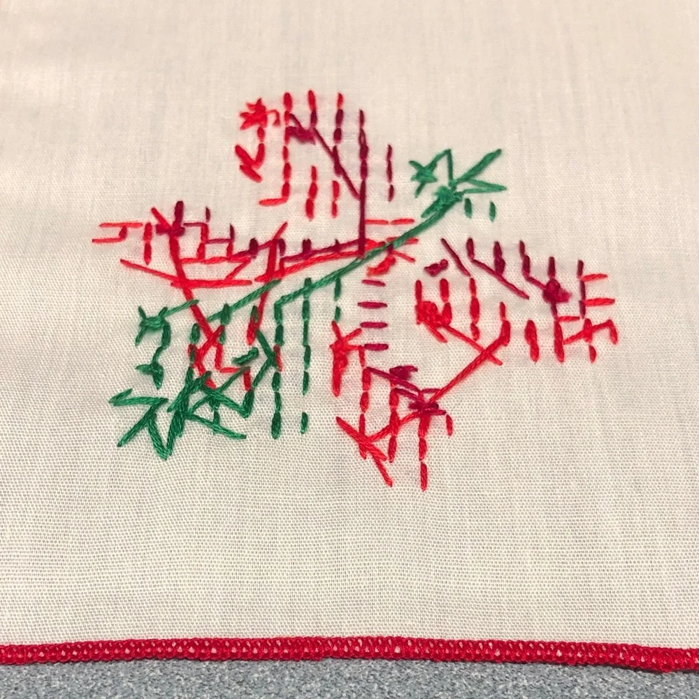 Embroidered Table Linens with Red Trim